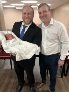 Rabbi Shmuel Katz, The Chicago Mohel with father and baby after the Bris Circumcision