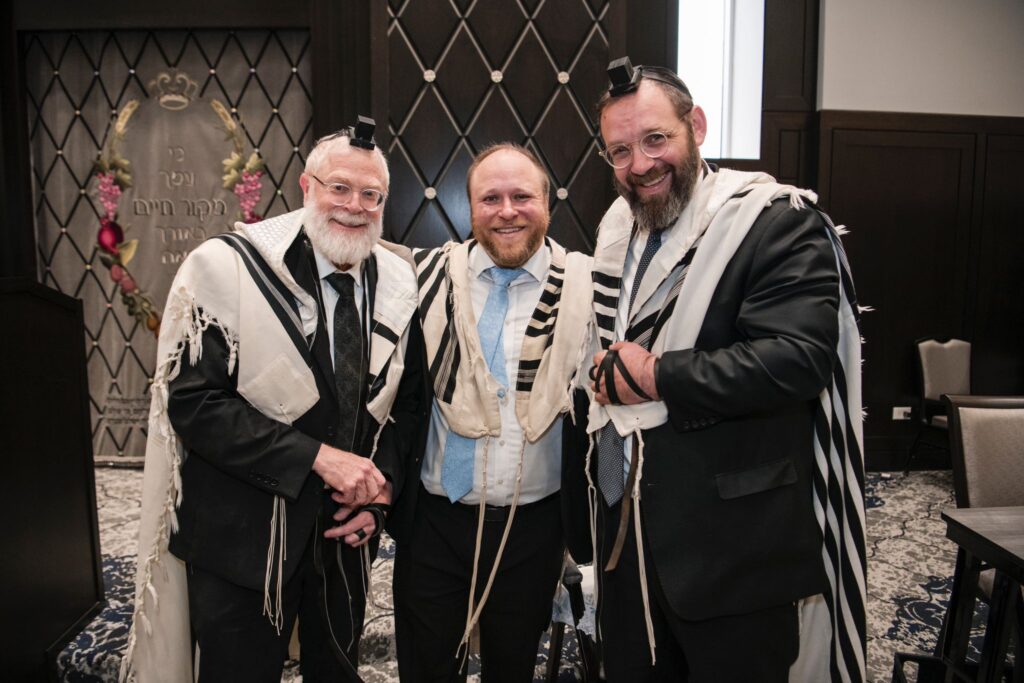 Rabbi Shmuel Katz, Rabbi Robinson and Rabbi Schecter at Mikor after Bris